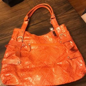 Orange purse (with tags)